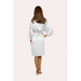 Rear view of knee length satin robe in a white colour