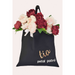 A cotton tote bag personalized for a member of the bridal party