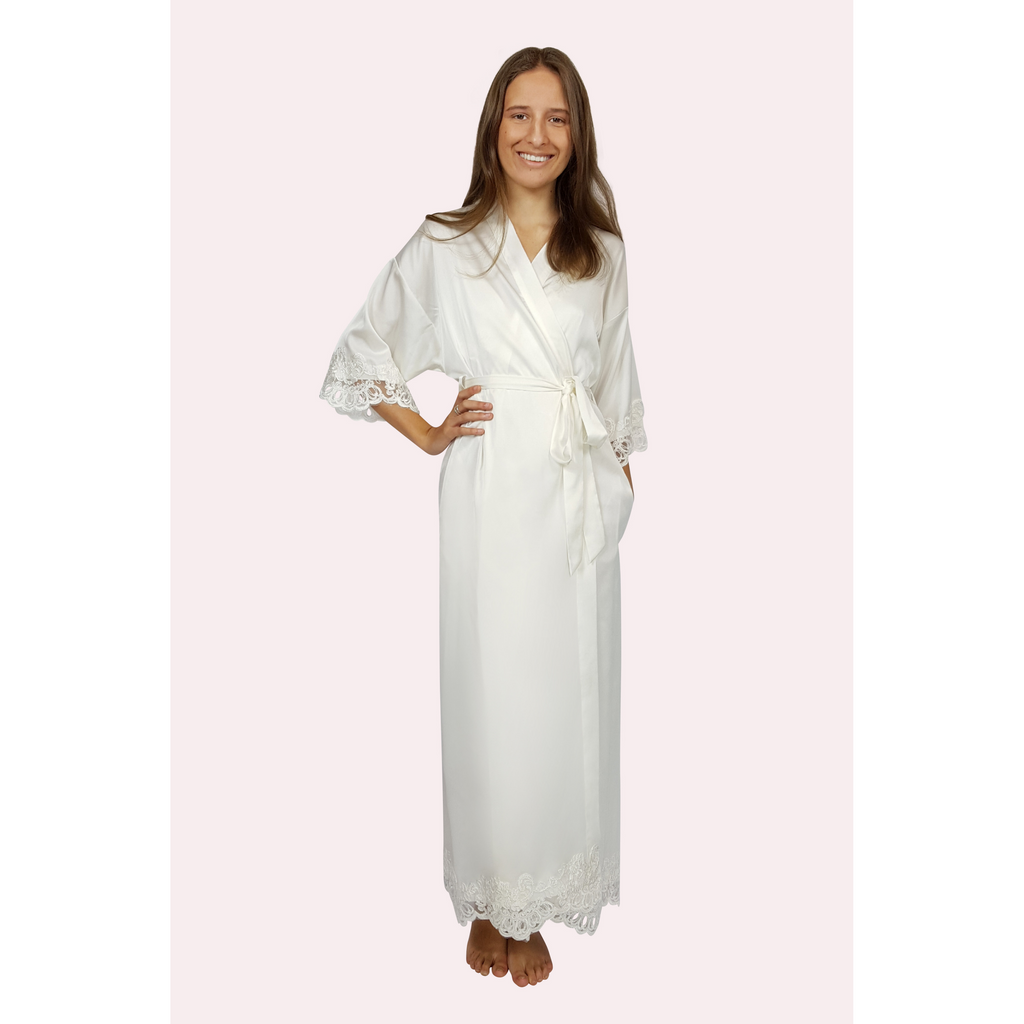 Long satin bridal robe in ivory colour with lace trimmed sleeve and hem edges