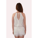 Rear view of lace overlayed satin camisole and shorts